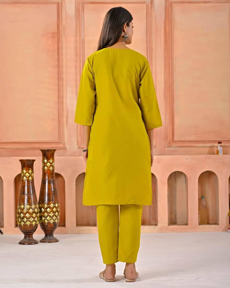 Dark yellow kurta set with printed motifs