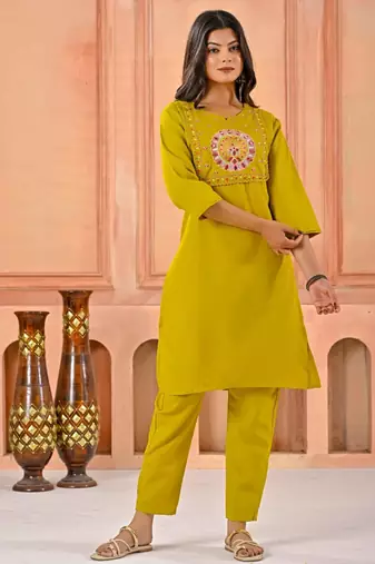 Dark yellow kurta set with printed motifs