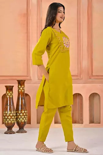 Dark yellow kurta set with printed motifs