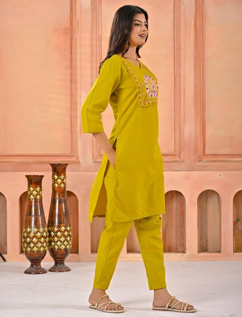 Dark yellow kurta set with printed motifs