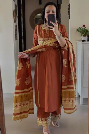 Rust kurta set with tassel accents