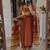 Rust kurta set with tassel accents