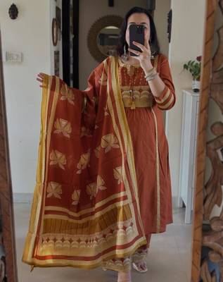 Rust kurta set with tassel accents 1