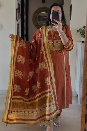 Rust kurta set with tassel accents