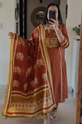 Rust kurta set with tassel accents