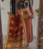 Rust kurta set with tassel accents