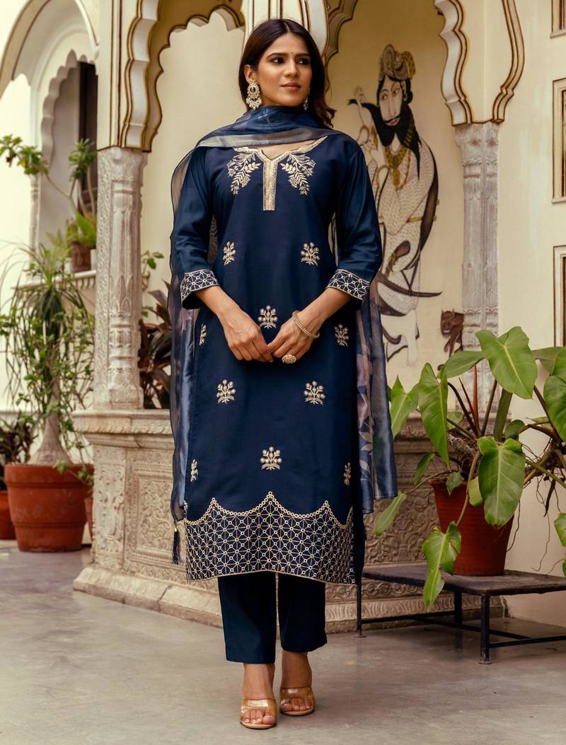 Teal blue silk kurta with geometric zari hem and floral dupatta