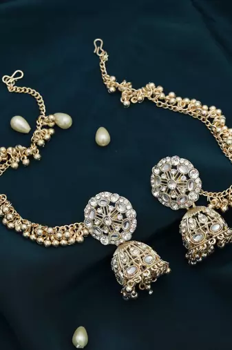 White color kundan earrings