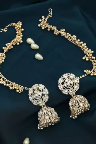 White color kundan earrings