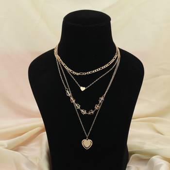 gold layered heart charm multi chain necklace 1