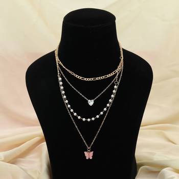 pink color multi layer chain necklace with pearl detail 1