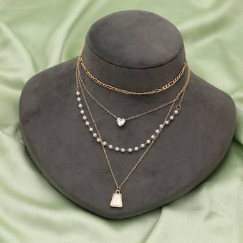 white color multi layer chain necklace with pearl detail 2