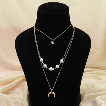 gold color multi layer chain necklace with pearl detail 1