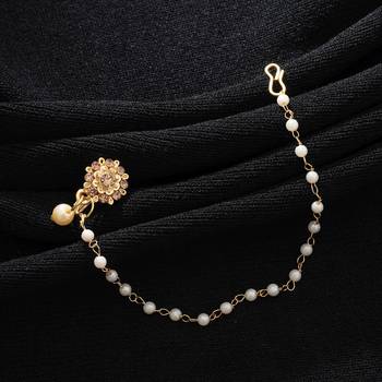 gold tone nose nath with pearl chain and floral accent 1