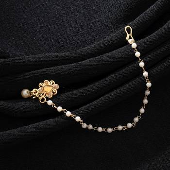 classic gold color nath with floral design and chain 2