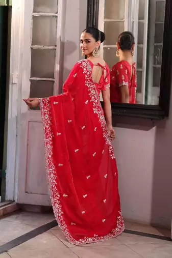 Red embroidered saree