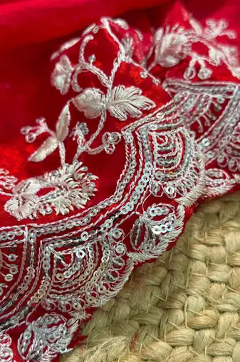 Red embroidered saree