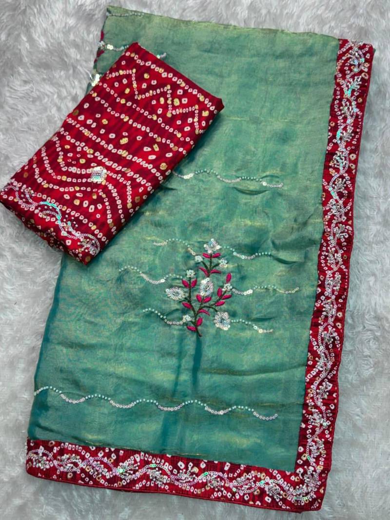 Teal green saree with red blouse