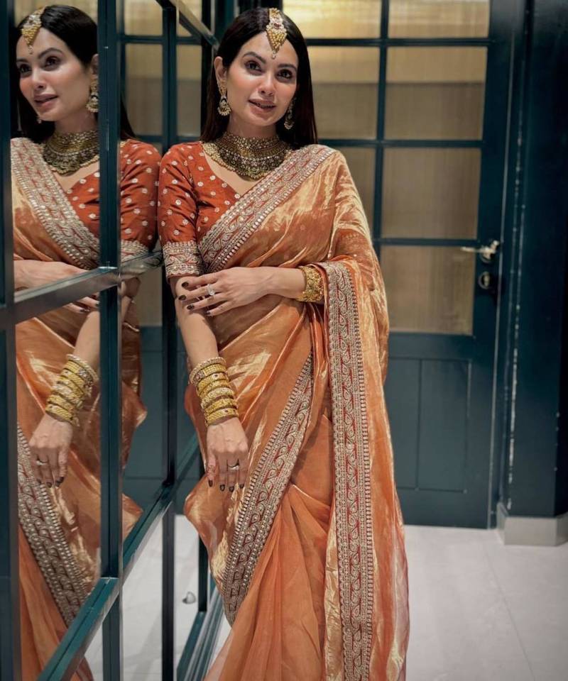 Orange gold silk embroidered saree