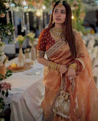 Orange gold silk embroidered saree 4