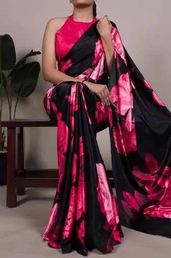 Black satin saree with pink floral print