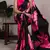 Black satin saree with pink floral print