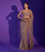 Beige net saree with sequin stripes