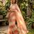 Peach tie-dye saree with elegant border