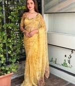 Yellow glass tissue position print handstitch butta work saree with matching blouse piece