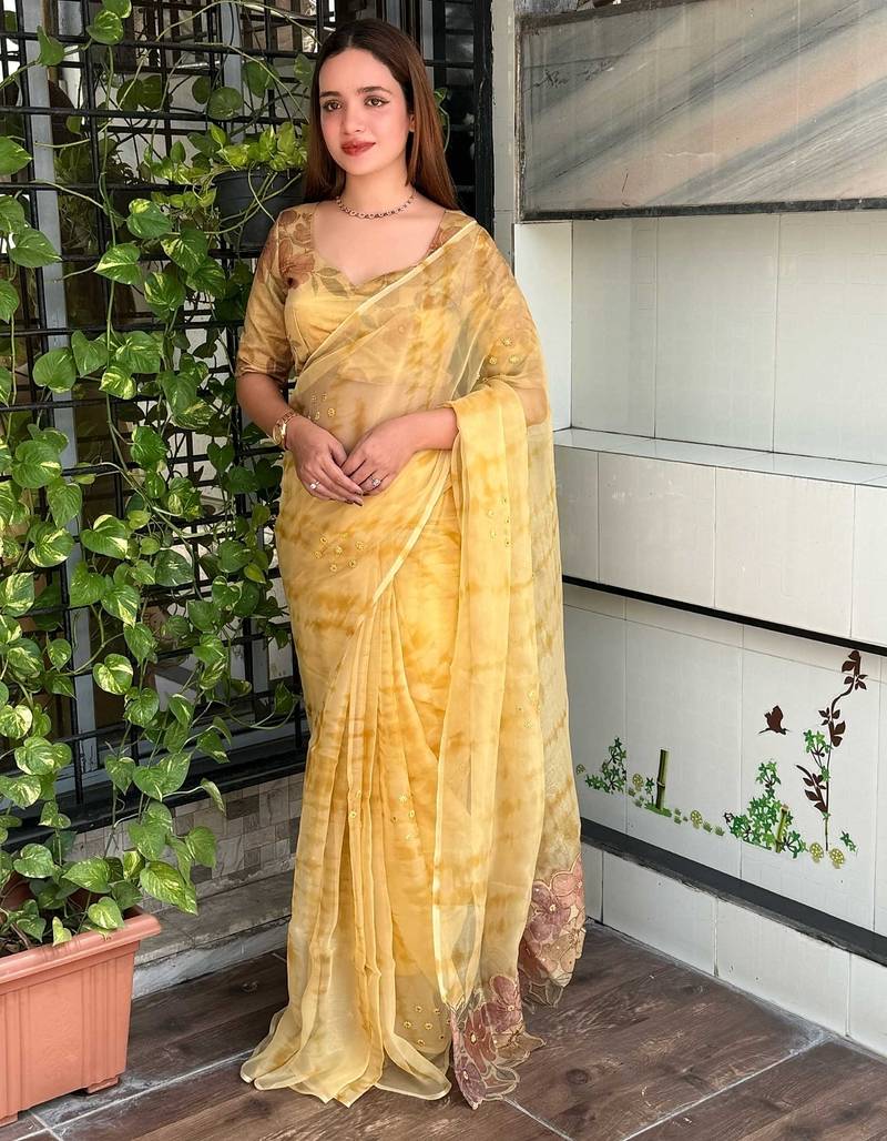 Yellow glass tissue position print handstitch butta work saree with matching blouse piece