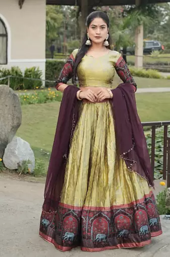 Cream Color Zari Weaving Work Silk Kalamkari Lehenga Choli With Unstitched Blouse