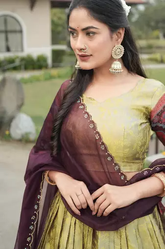 Cream Color Zari Weaving Work Silk Kalamkari Lehenga Choli With Unstitched Blouse