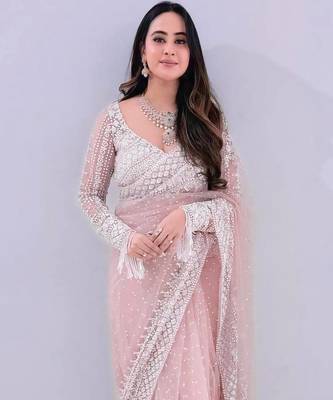 Blush pink embroidered net saree 1