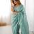 Pastel green embroidered saree