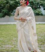 Off White linen saree with embroidered blouse