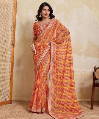 Orange leheriya printed embroidered saree 1