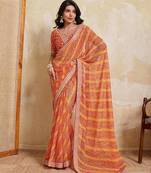 Orange leheriya printed embroidered saree