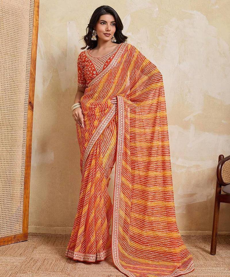 Orange leheriya printed embroidered saree