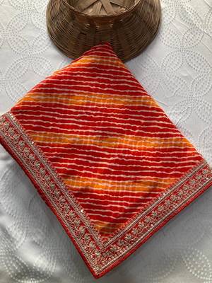 Orange leheriya printed embroidered saree 2