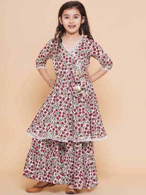 White red floral with green sleeves likely cotton angrakha-style top kurti with sharara / lehenga-style bottom set 1