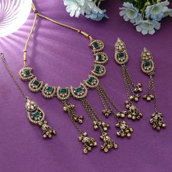 green color kundan necklace set with earrings and maang tikka 1