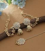 ethnic white kundan jhumka earrings with matching tikka
