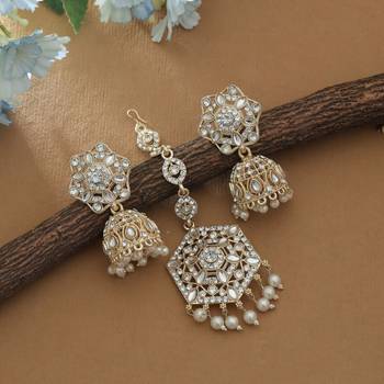 white color kundan earrings and maang tikka set 1