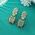 Pista green color american diamond earrings