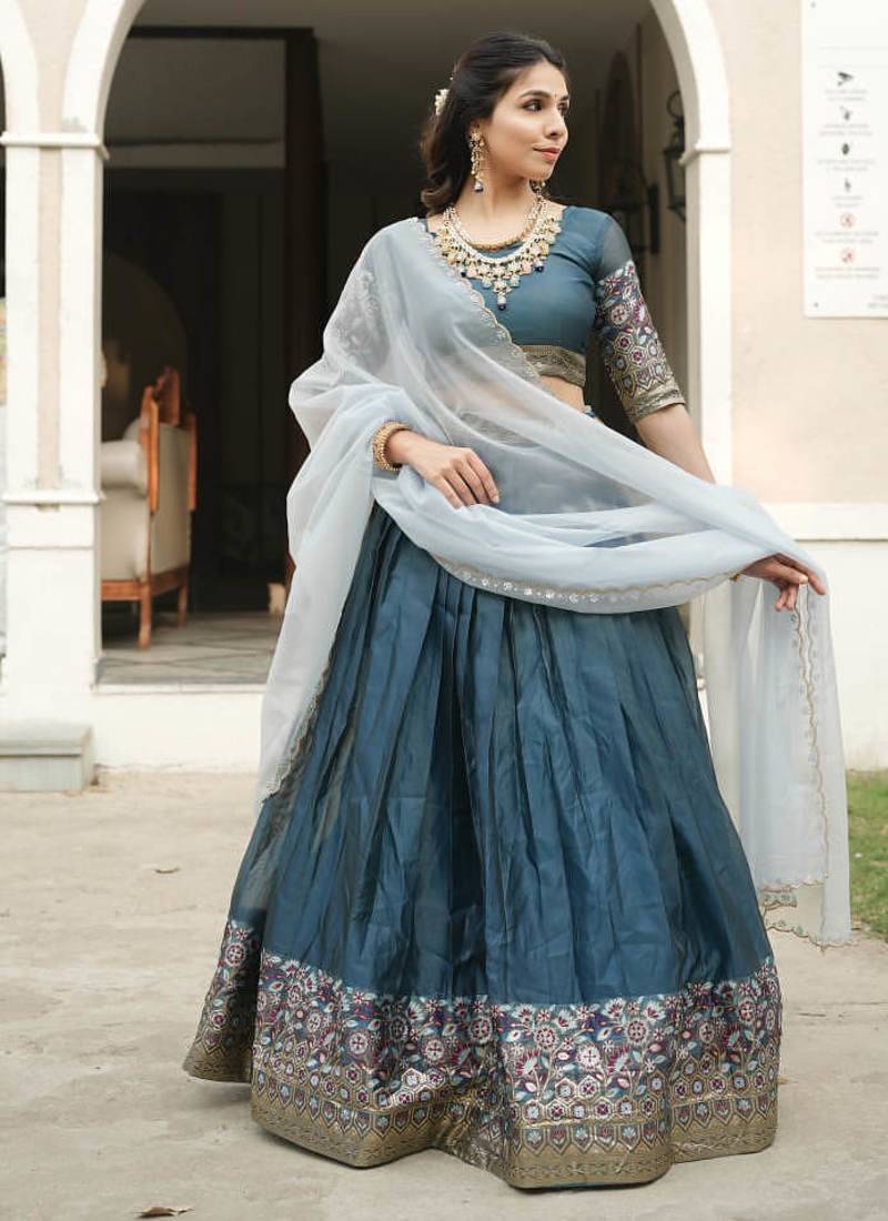 Rama Color Silver-Golden Zari Weaving Work Silk Lehenga Choli With Unstitched Blouse