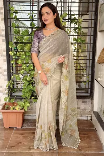 Beige organza zari weaving embroiderd saree with embroiderd blouse piece