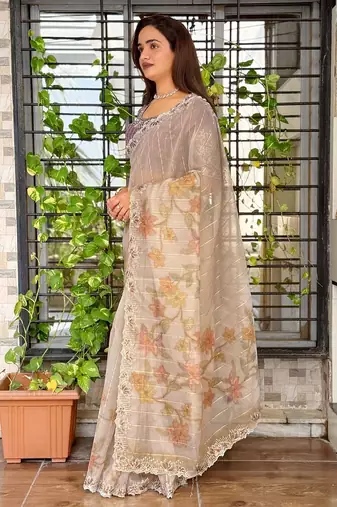 Beige organza zari weaving embroiderd saree with embroiderd blouse piece