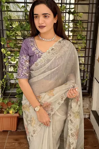 Beige organza zari weaving embroiderd saree with embroiderd blouse piece