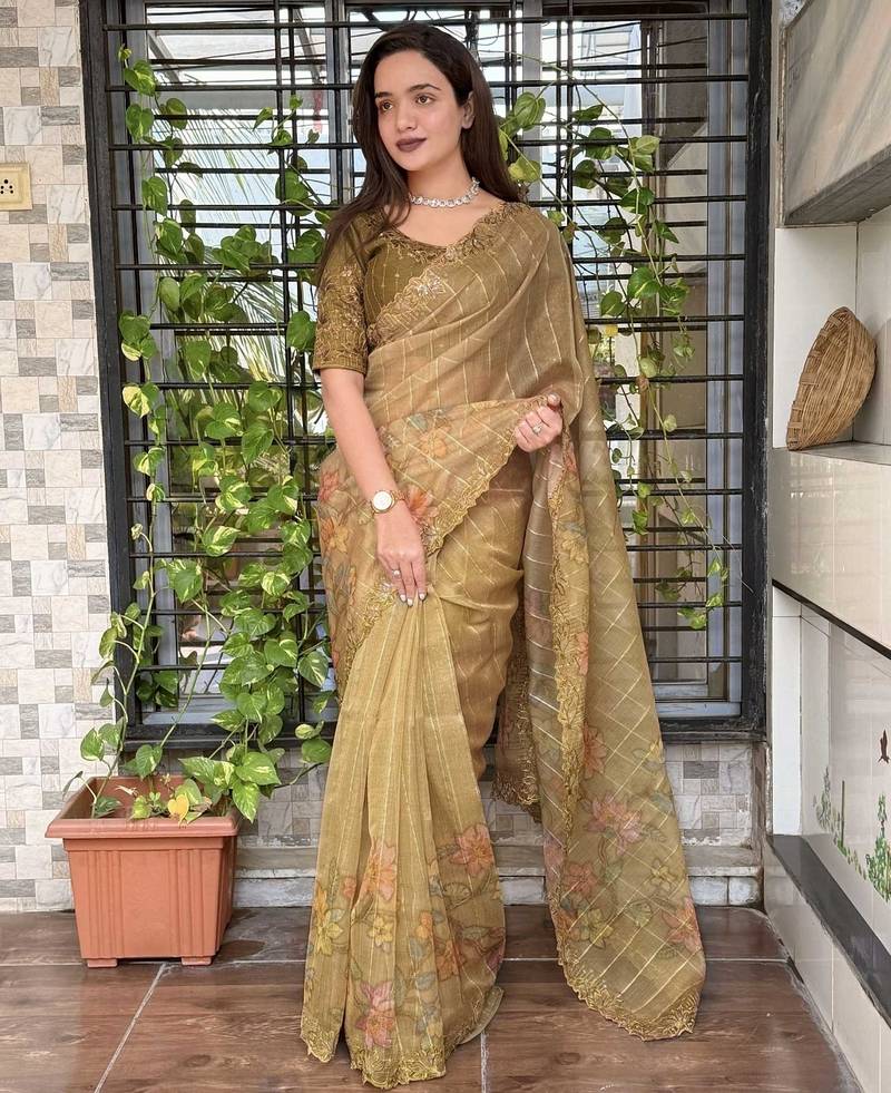 Olive organza zari weaving embroiderd saree with embroiderd blouse piece