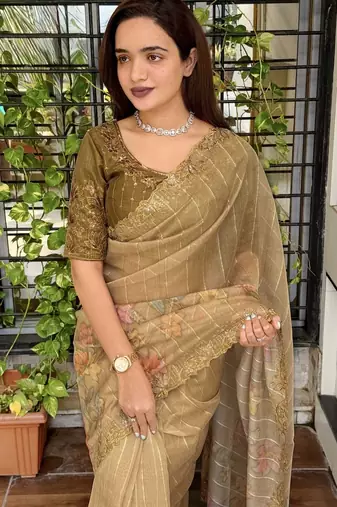 Olive organza zari weaving embroiderd saree with embroiderd blouse piece